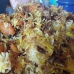 the food with pumpkin and rice and onions
