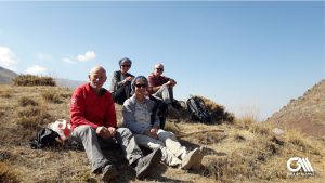 the photo shows Foreign Tourist are trekking in Alamut Valley in Summer time.
